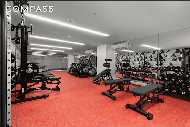 gym featuring an AC wall unit