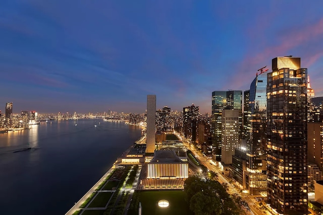 property's view of city featuring a water view