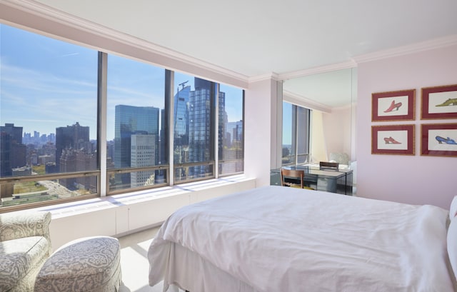 bedroom with crown molding and multiple windows