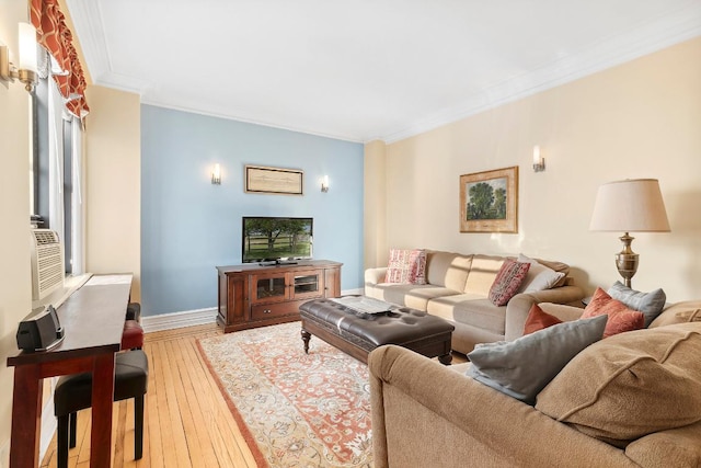 living room featuring ornamental molding and light wood-type flooring