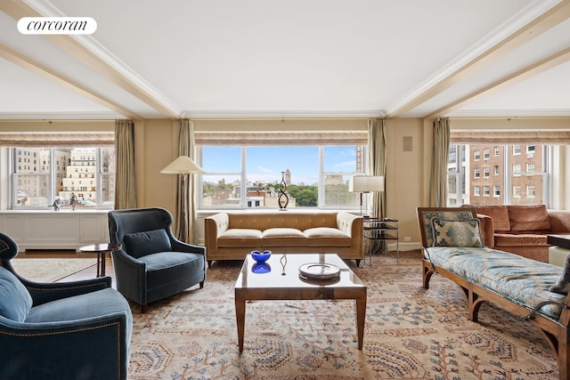 interior space featuring visible vents, wood finished floors, baseboards, and ornamental molding