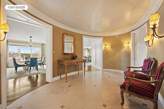 interior space featuring baseboards, visible vents, and ornamental molding