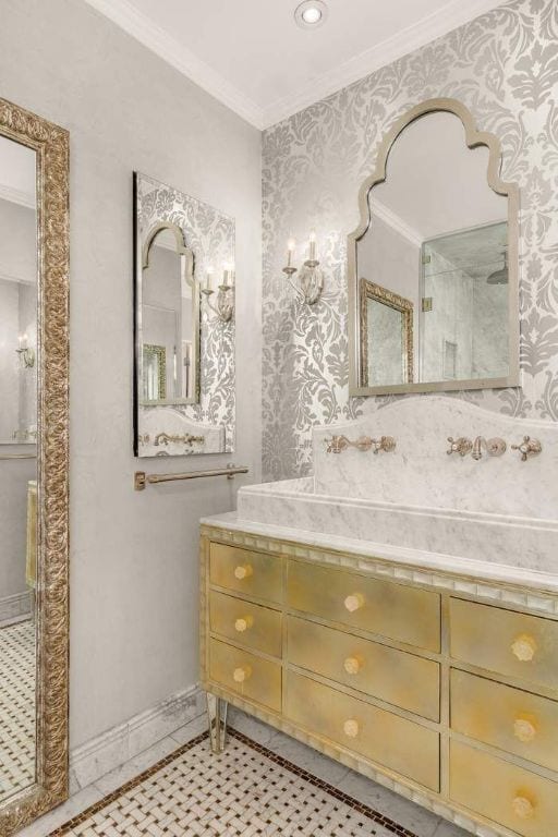 bathroom featuring ornamental molding, vanity, and tile patterned floors