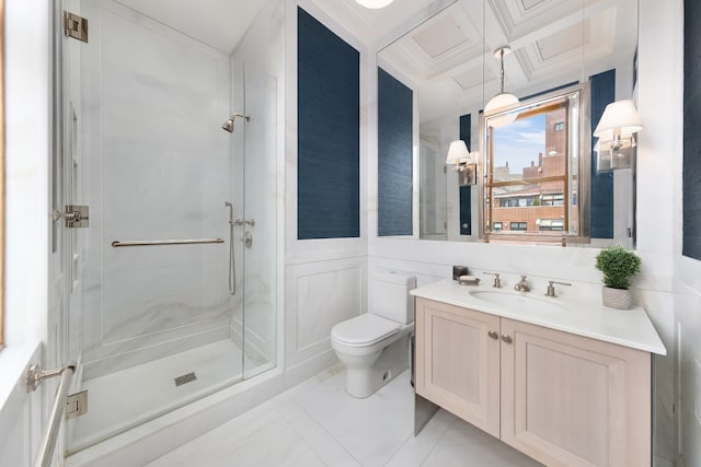 bathroom with vanity, a stall shower, and toilet