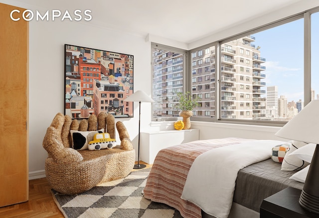 bedroom with a view of city