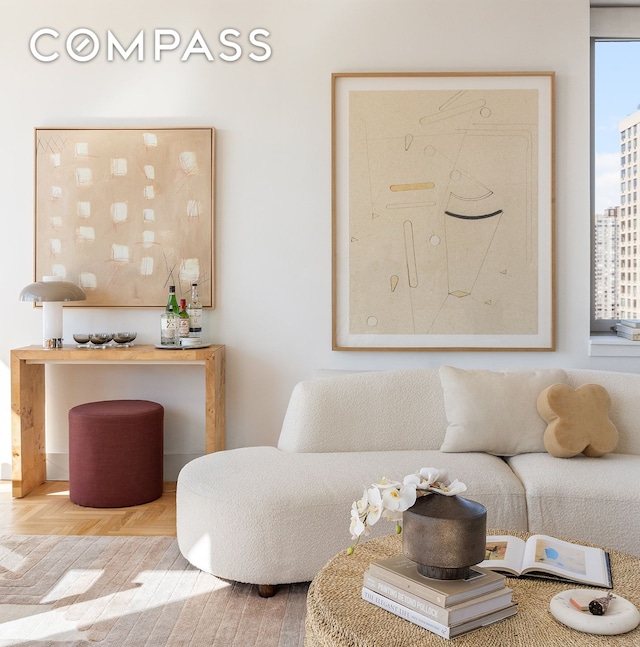 living room featuring a view of city and parquet floors