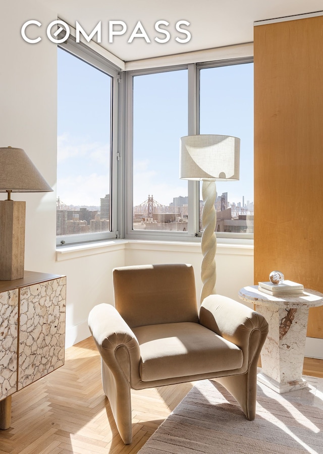 sitting room featuring a view of city