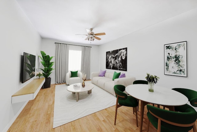 living room with light hardwood / wood-style floors and ceiling fan