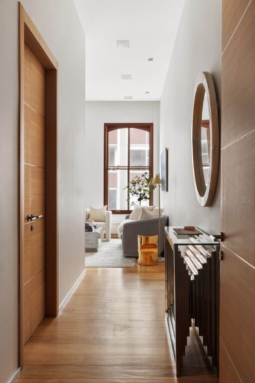 full bathroom with toilet, vanity, plus walk in shower, and tile patterned flooring