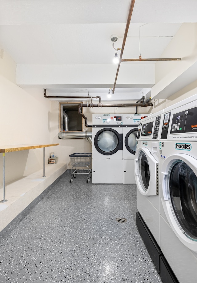 shared laundry area with washer and dryer