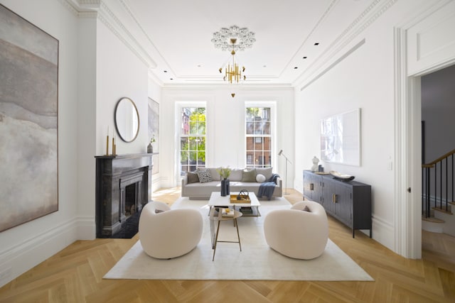 living area featuring crown molding, light parquet flooring, and an inviting chandelier