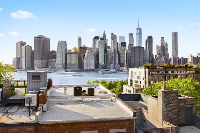 property's view of city with a water view