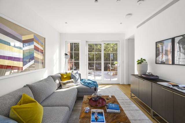 living area with light wood-style flooring