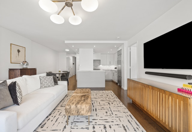 living room featuring dark hardwood / wood-style floors