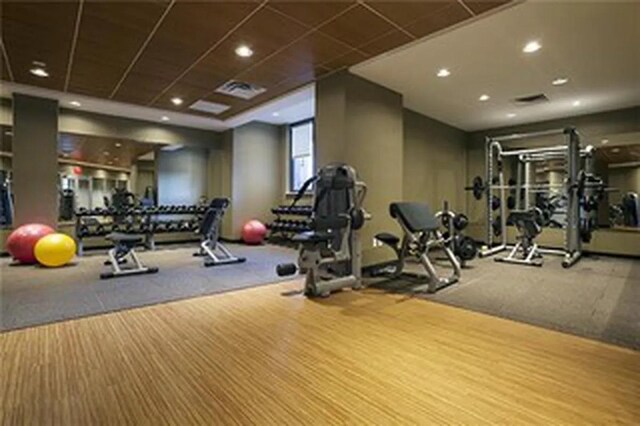 workout area with recessed lighting