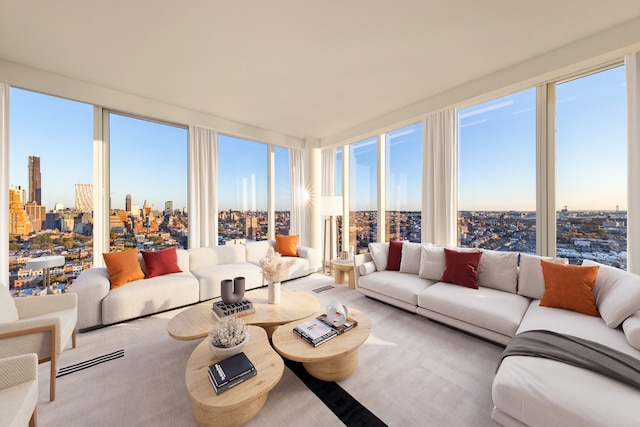 sunroom / solarium featuring a city view