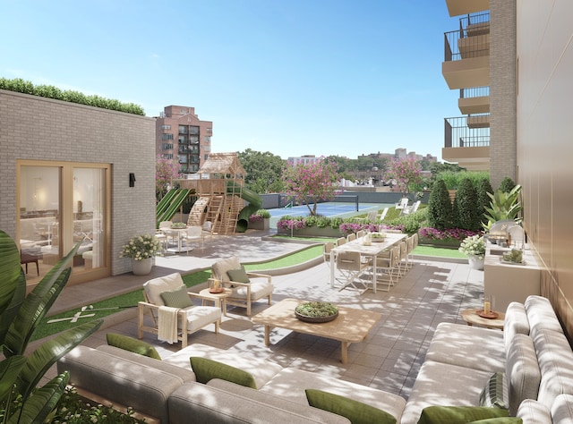 view of patio featuring an outdoor living space and playground community