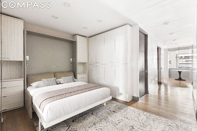 bedroom featuring light wood-type flooring