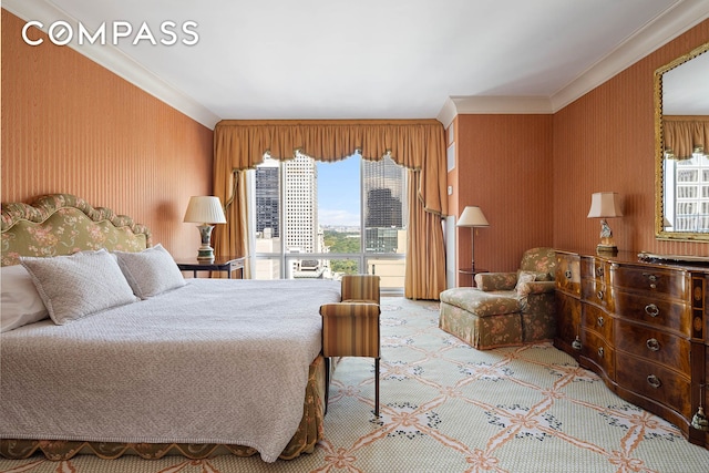 carpeted bedroom with ornamental molding