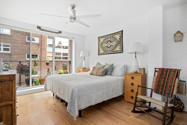 308 E 30th St Unit 1, New York City, NY 10016 - bedroom with wood finished floors and a ceiling fan