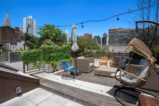 view of pool with an outdoor living space and a patio area