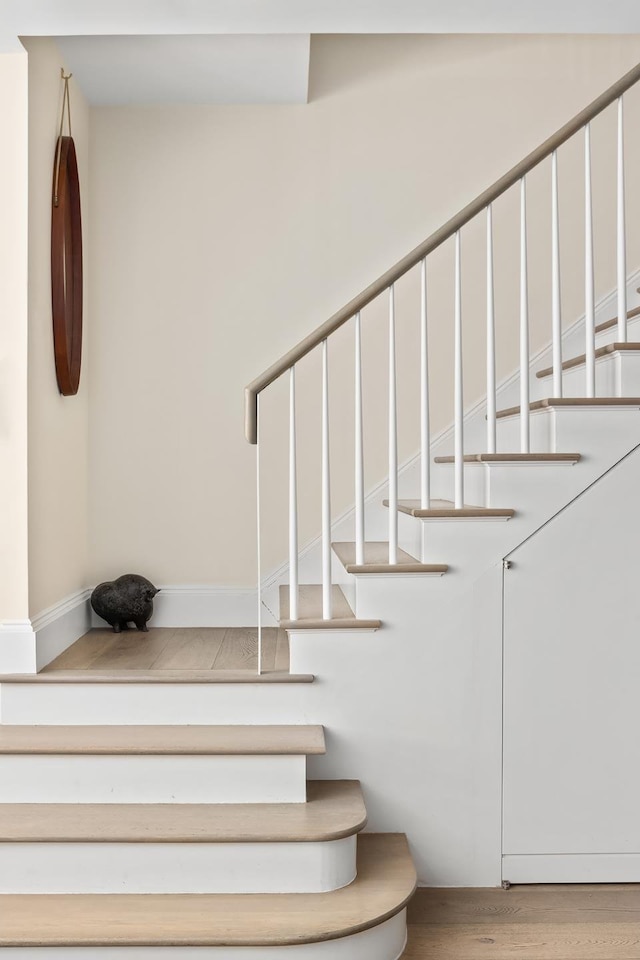 308 E 30th St Unit 1, New York City, NY 10016 - staircase with wood finished floors