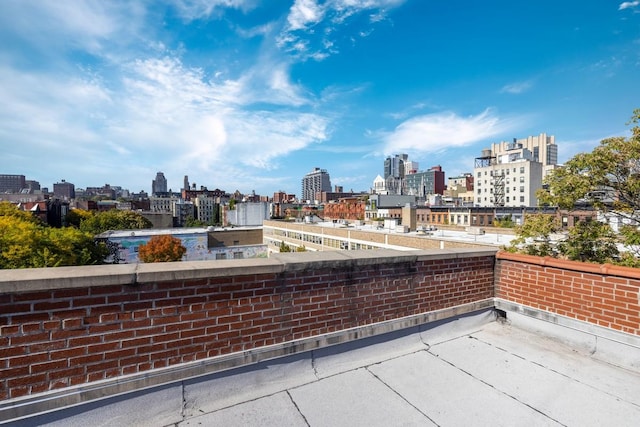 view of patio / terrace featuring a view of city