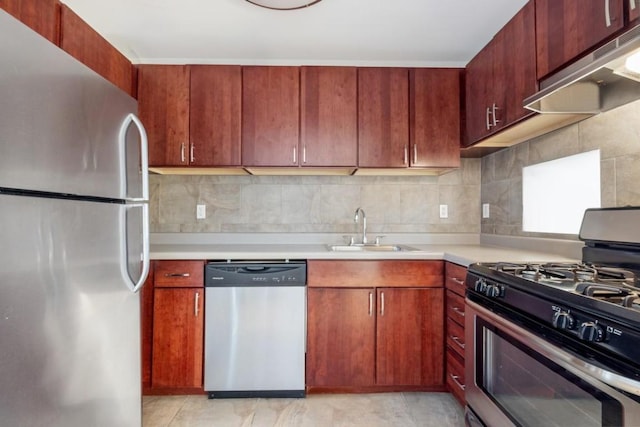 kitchen with tasteful backsplash, sink, stainless steel appliances, and light tile patterned flooring