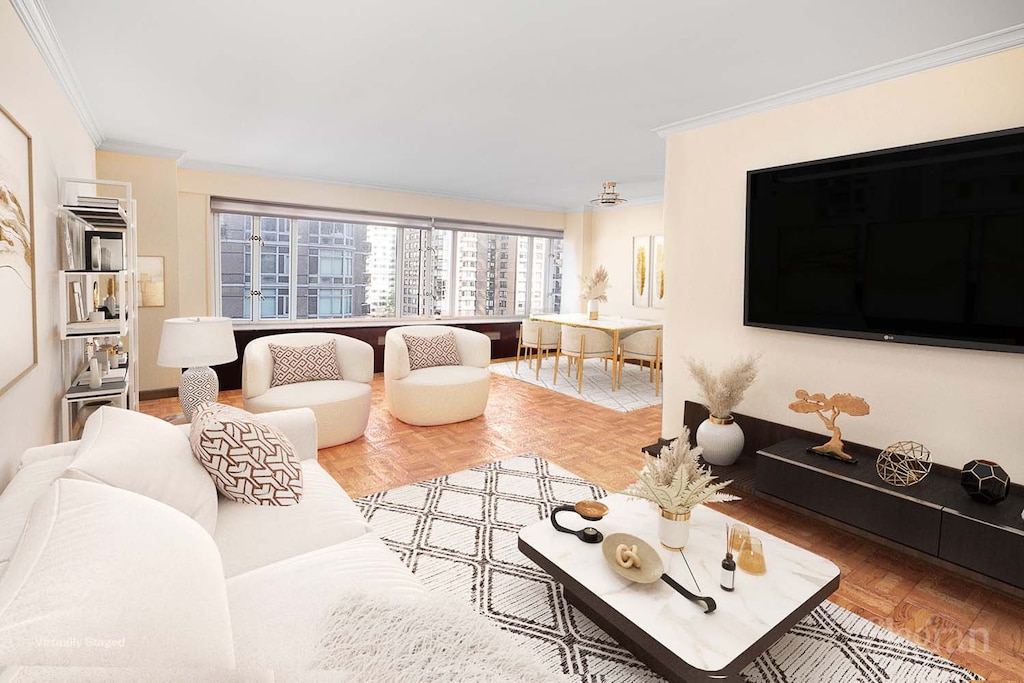 living room featuring crown molding