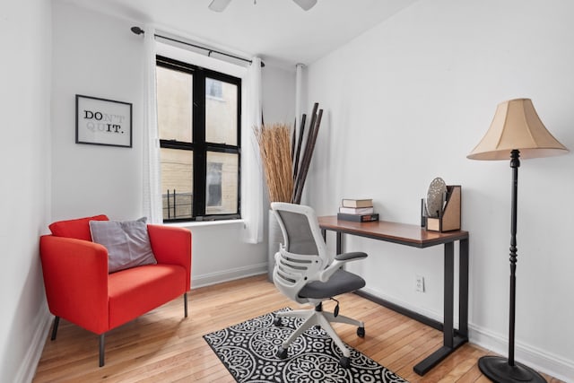 office with wood-type flooring, plenty of natural light, and ceiling fan