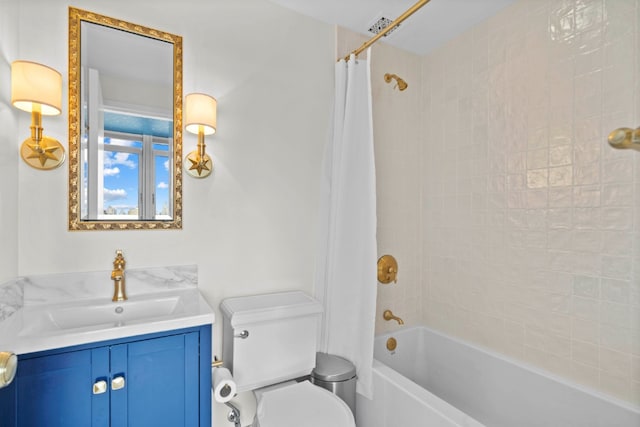 full bathroom featuring toilet, shower / tub combo, and vanity