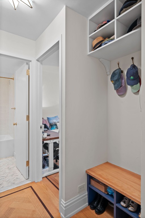 mudroom featuring wood-type flooring