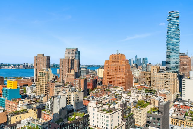 property's view of city featuring a water view