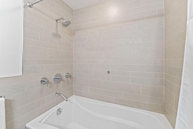 bathroom with shower / bath combination