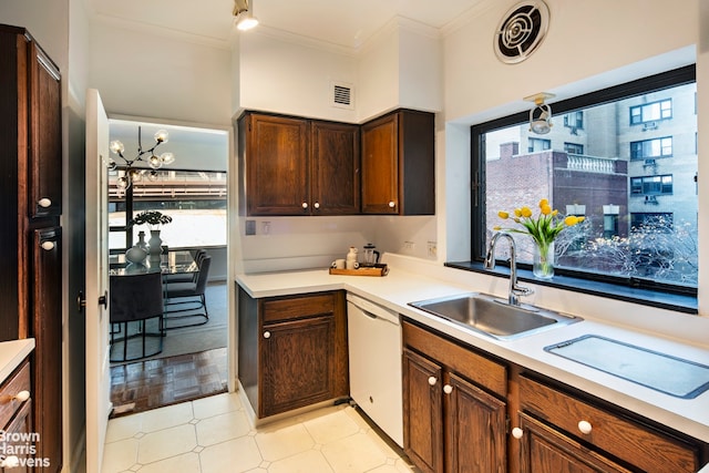 kitchen with white dishwasher, sink, crown molding, and dark brown cabinetry