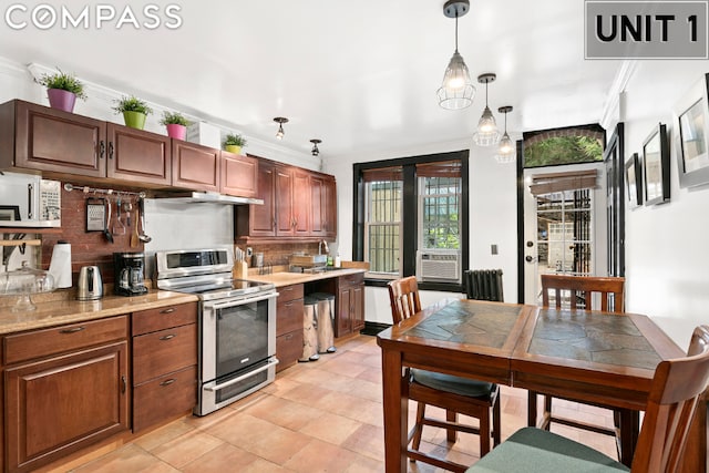 kitchen with cooling unit, backsplash, hanging light fixtures, stainless steel range with electric stovetop, and crown molding