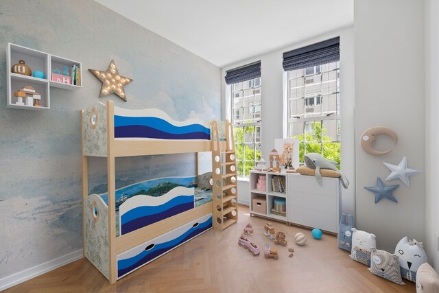 bedroom with parquet flooring