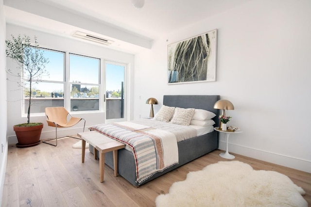 bedroom featuring light hardwood / wood-style floors