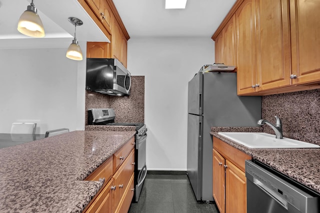 235 E 40th St Unit 24H, New York City, NY 10016 - kitchen featuring stainless steel appliances, tasteful backsplash, hanging light fixtures, and dark stone countertops
