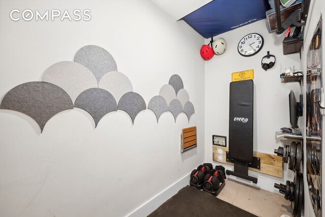 340 Chauncey St Unit Ph4, New York City, NY 11233 - exercise area with tile patterned flooring and baseboards