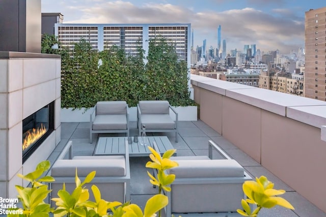 balcony featuring a city view and outdoor lounge area