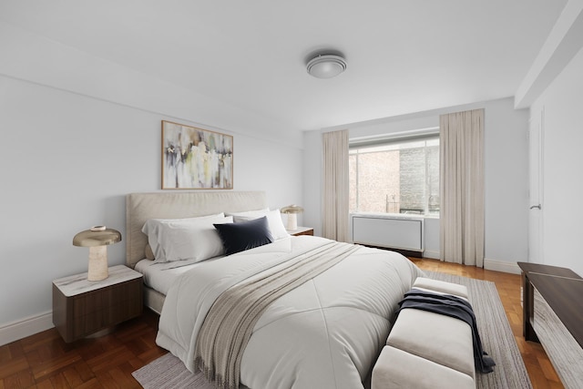 bedroom featuring baseboards