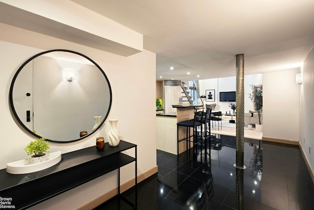 253 W 73rd St Unit 2G, New York City, NY 10023 - hallway with recessed lighting and stairway