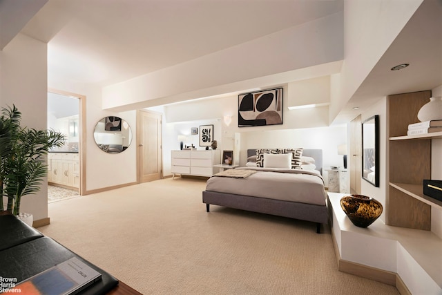 253 W 73rd St Unit 2G, New York City, NY 10023 - bedroom with carpet floors and ensuite bath
