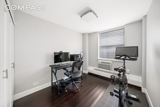 office space with dark wood-type flooring