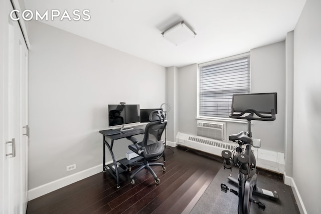 office space featuring wood finished floors and baseboards