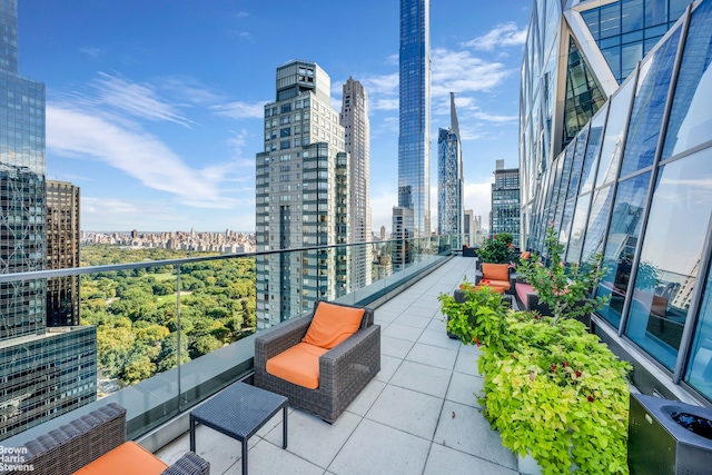 balcony featuring a view of city