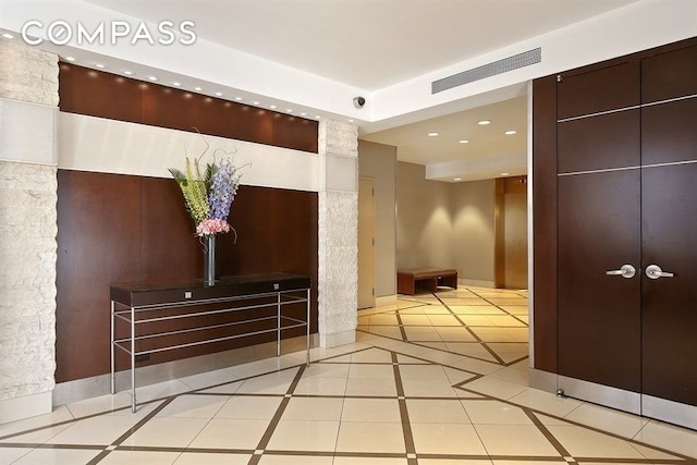 reception area featuring recessed lighting and a security system