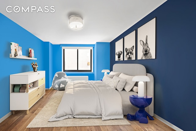 515 E 72nd St Unit 3Klmn, New York City, NY 10021 - bedroom with baseboards and wood finished floors