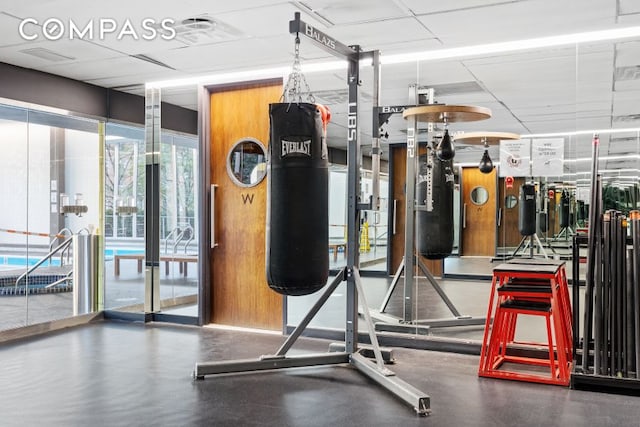 515 E 72nd St Unit 3Klmn, New York City, NY 10021 - exercise room with a drop ceiling